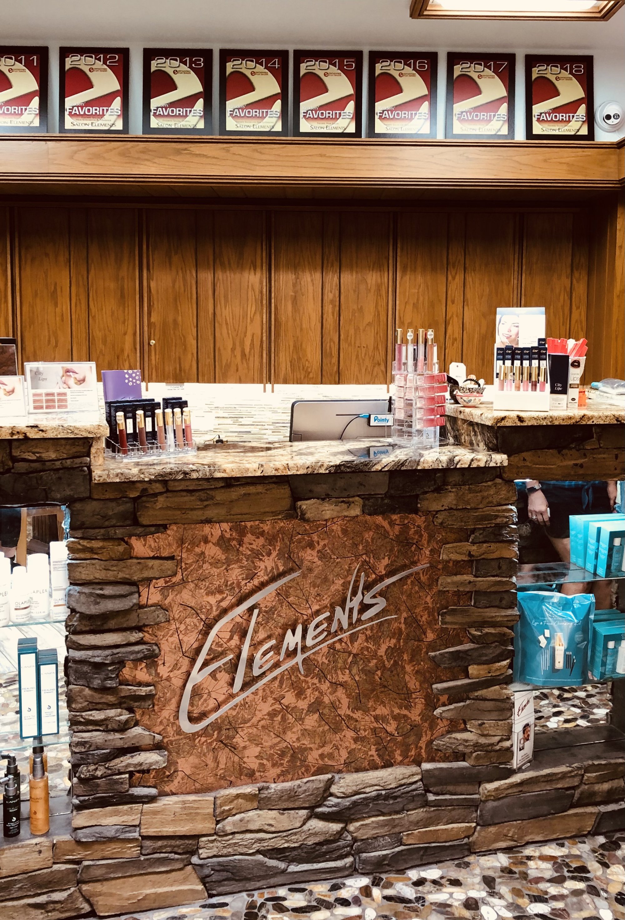 Artistic hair styling at Salon Elements